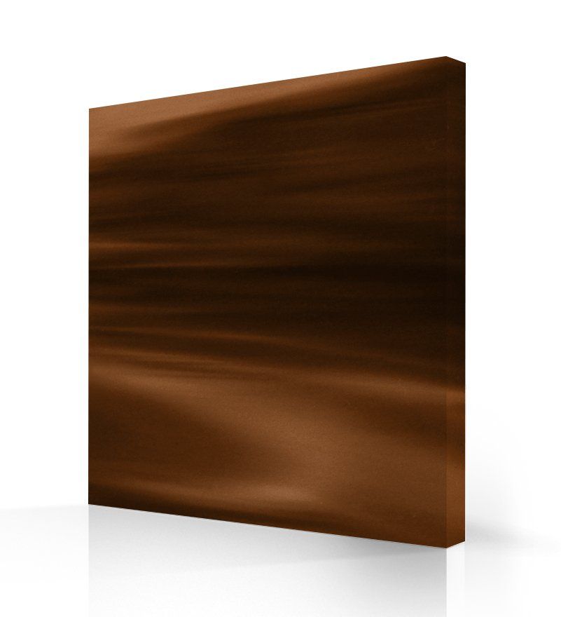 Un morceau de bois brun est posé sur une surface blanche