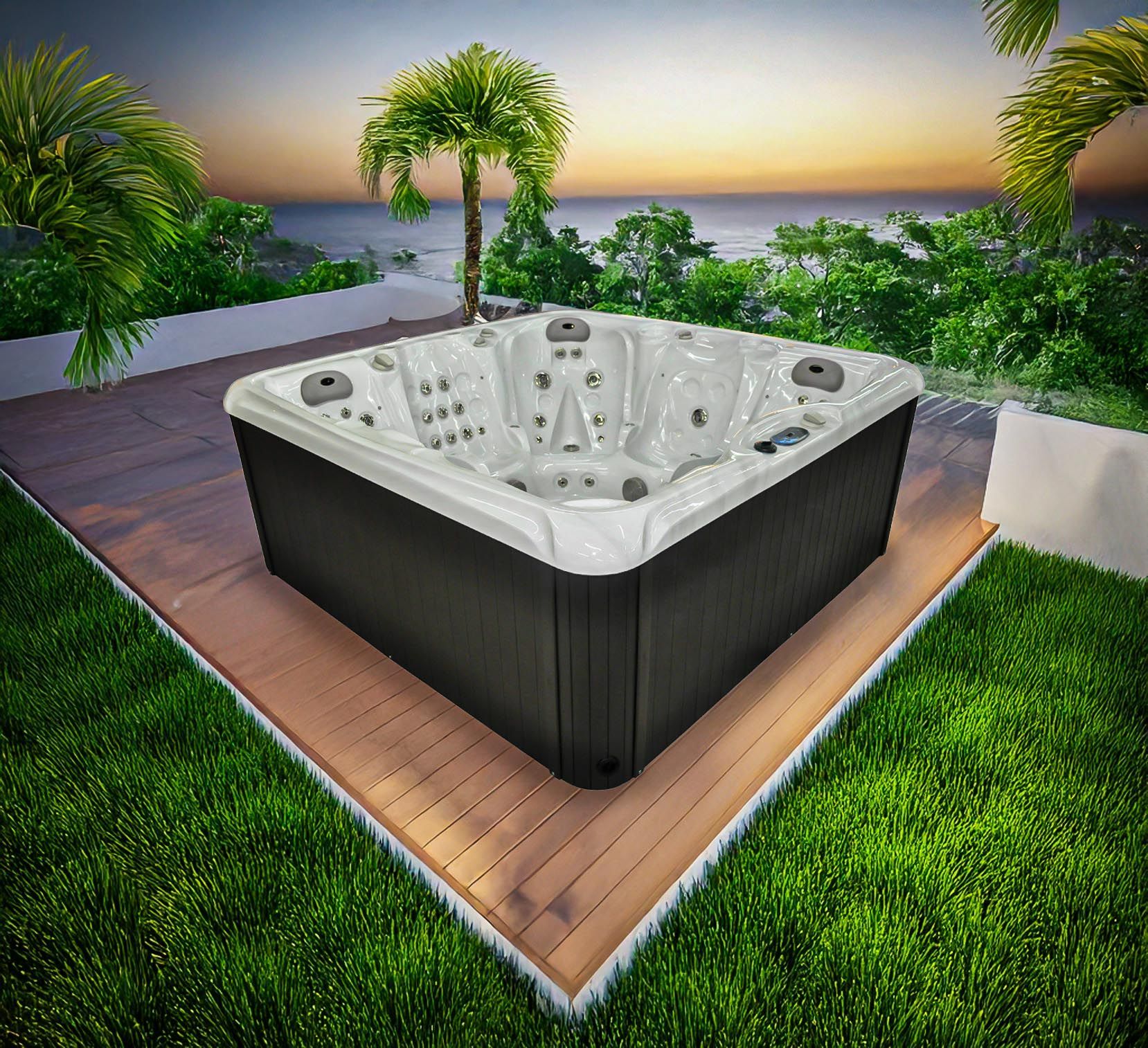Un jacuzzi de luxe sur une terrasse en bois, surplombant l'océan au coucher du soleil, entouré d'une végétation luxuriante.