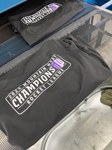 Two dark gray shirts with 