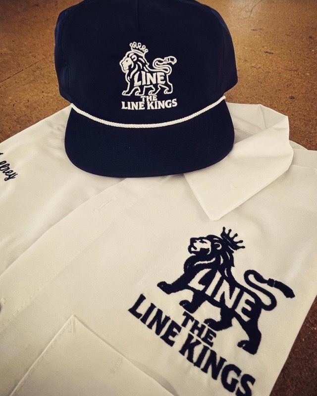 Navy hat and white shirt with 