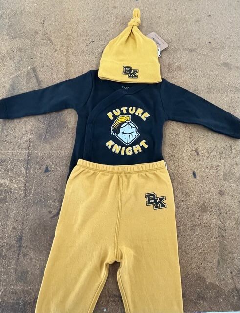 A yellow and black baby outfit with a 