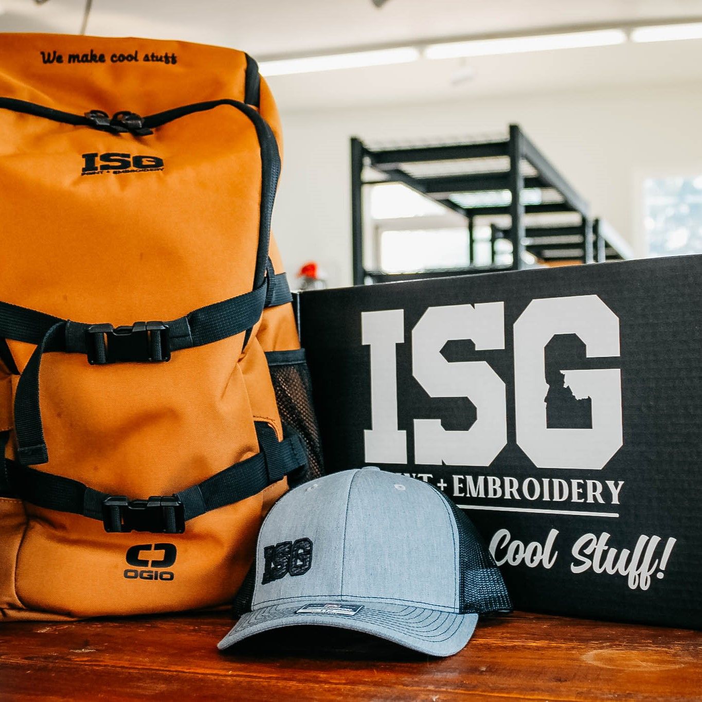 Orange backpack, hat, and box with