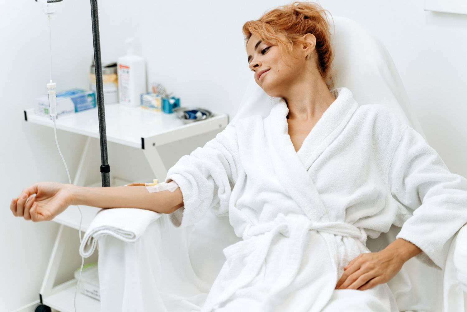 a woman getting IV therapy