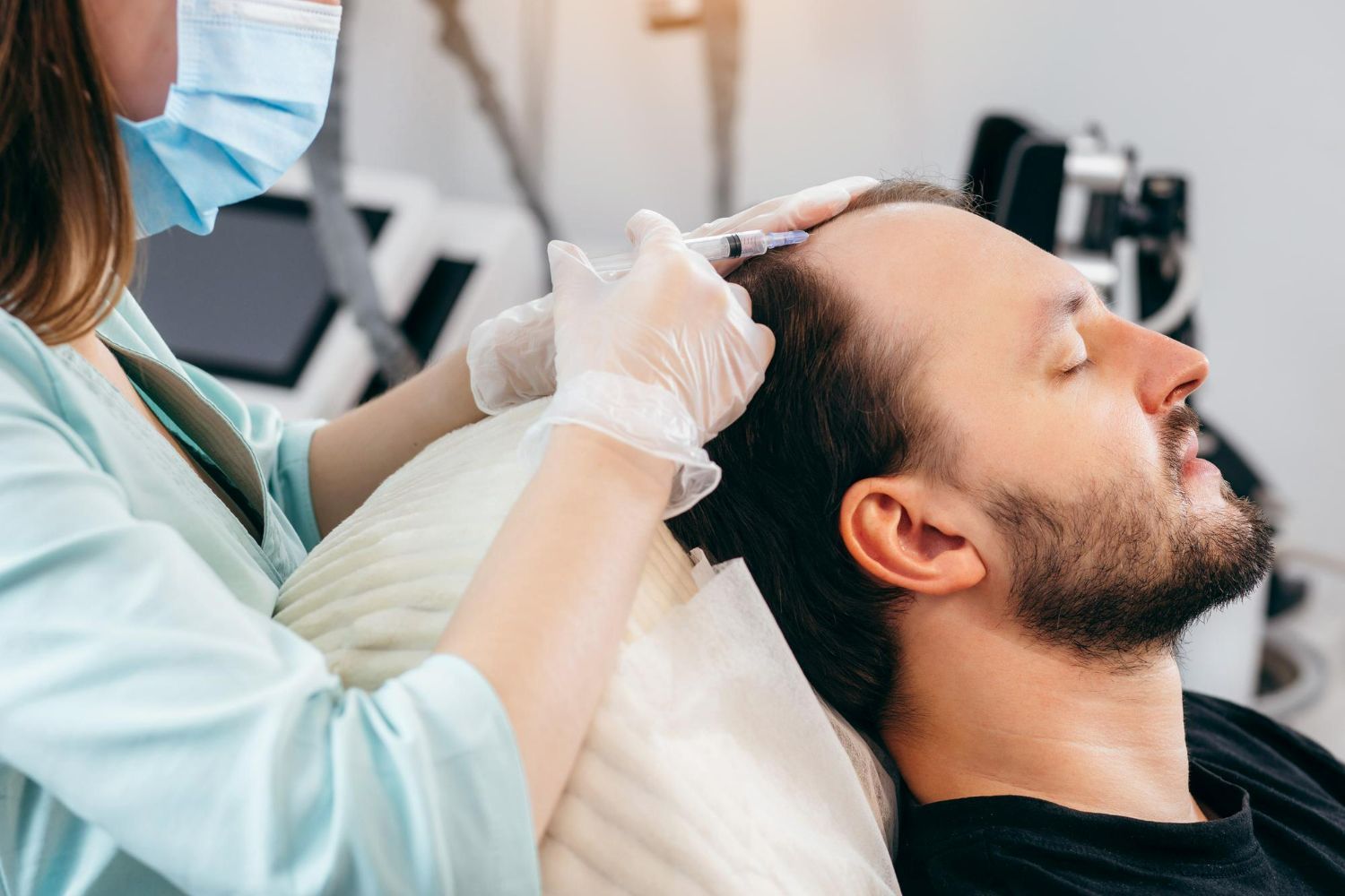 a man getting PRP therapy for hair