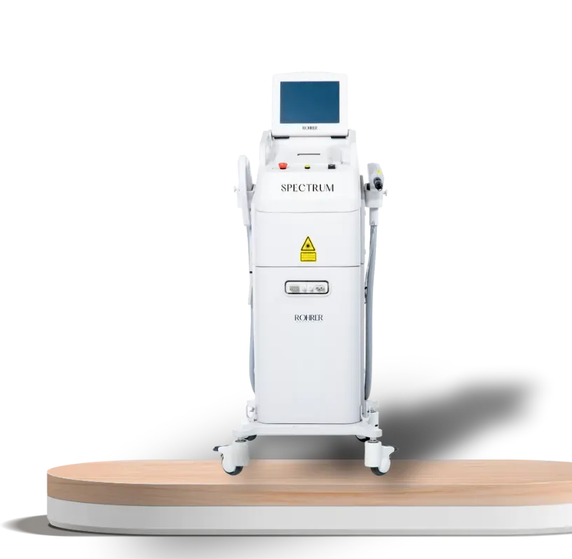 White medical laser machine on a wood platform with a digital display and various hand pieces.