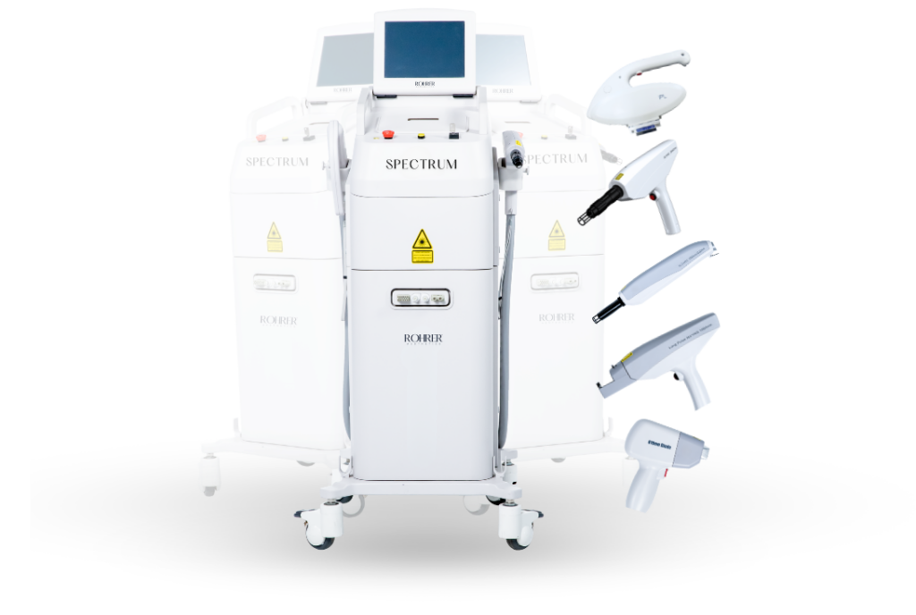 White medical laser machine with multiple handpieces.