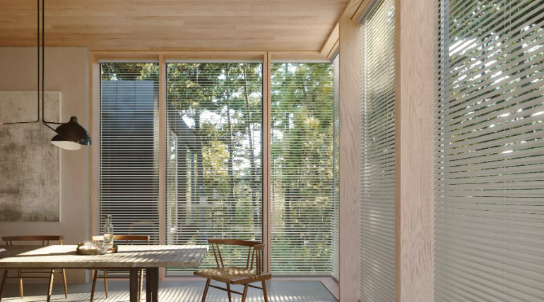 Brown Hunter Douglas EverWood® Faux Wood Blinds in a Modern Dining Area near Lockport, NY
