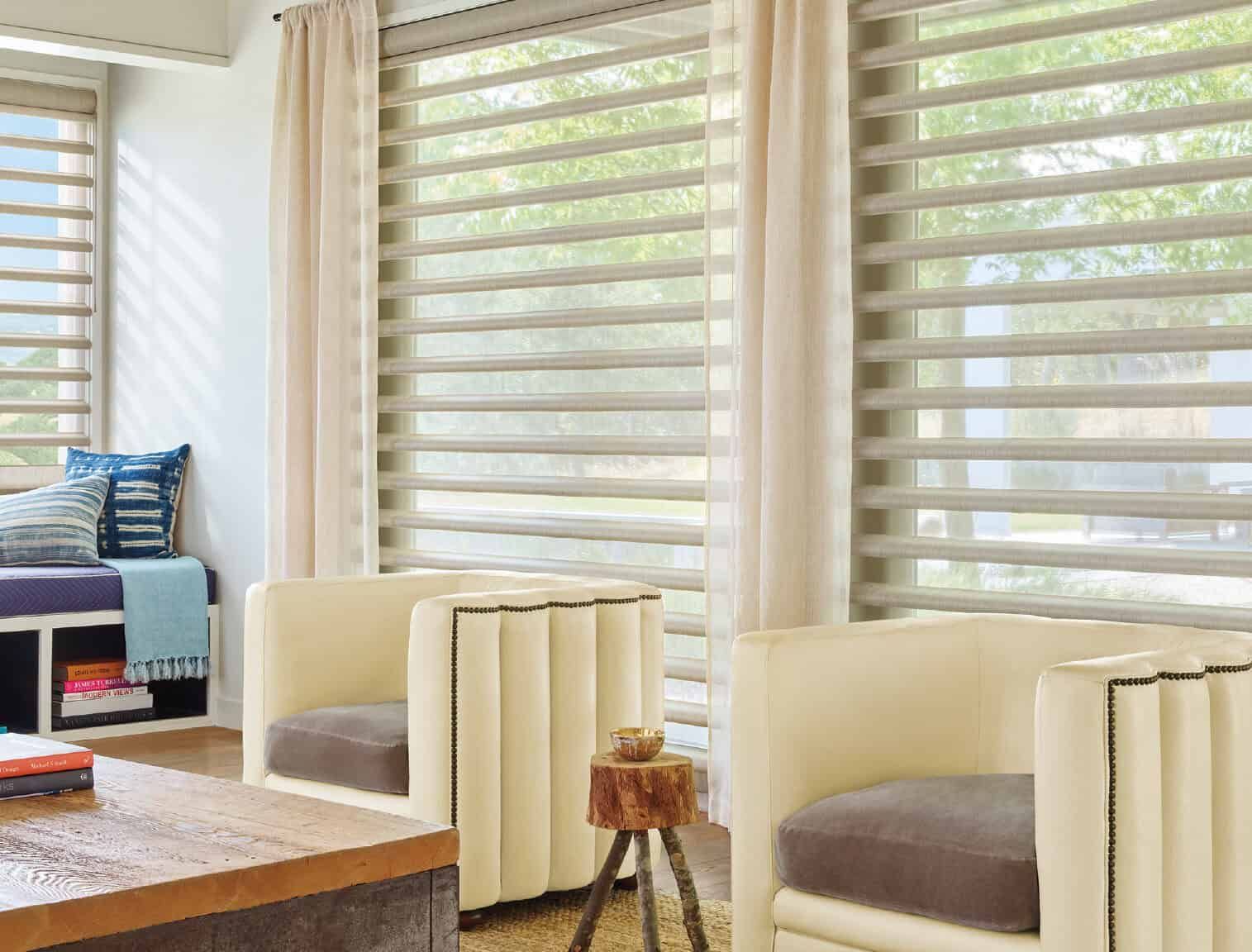 Hunter Douglas Silhouette® Sheer Shades on Wall to Wall Windows in a Living Room near Lockport, NY