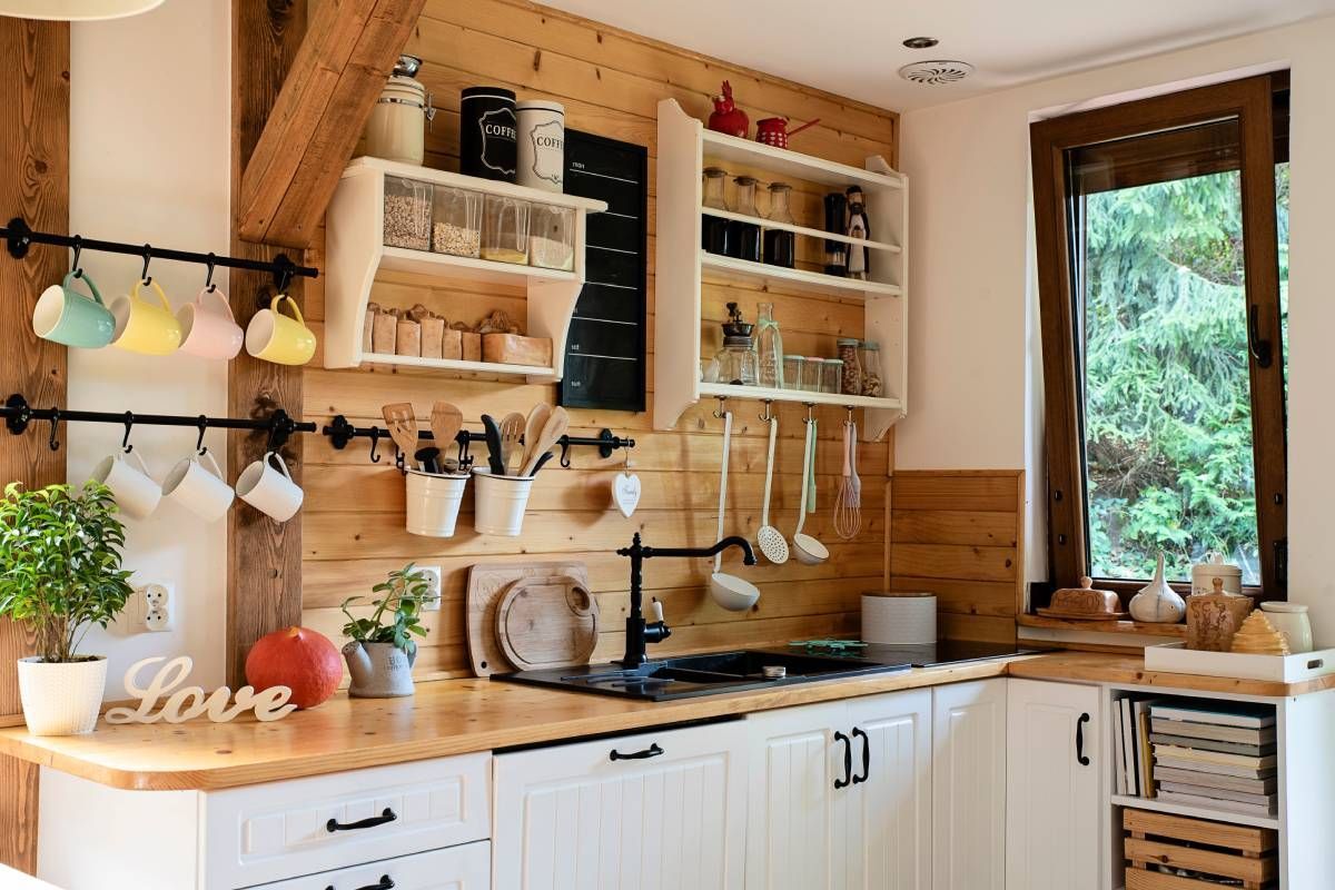 A kitchen that leans into the rustic interior design style at Julie Muscato Home & Gifts near Lockport, New York (NY)