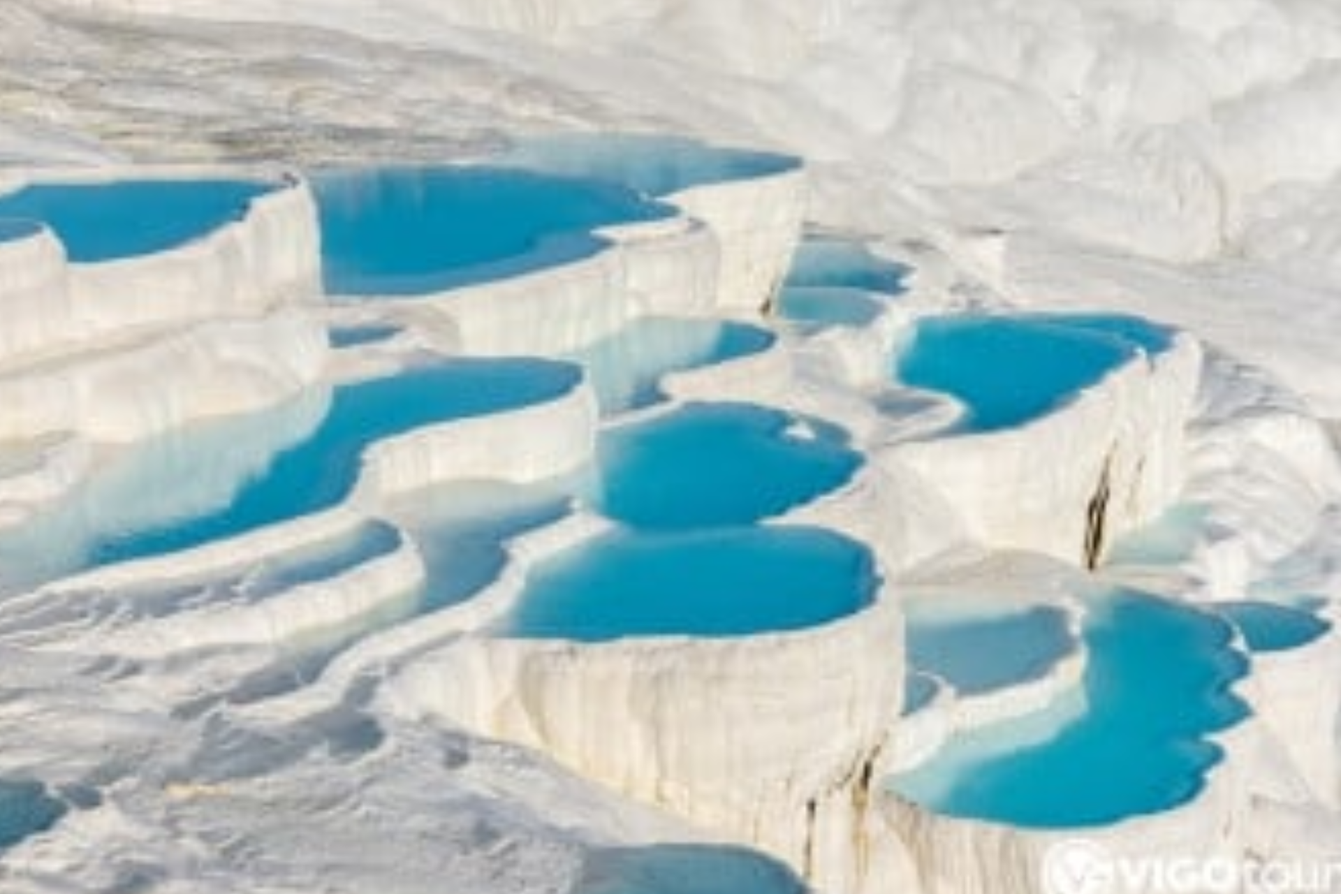 A large amount of water is coming out of the ground