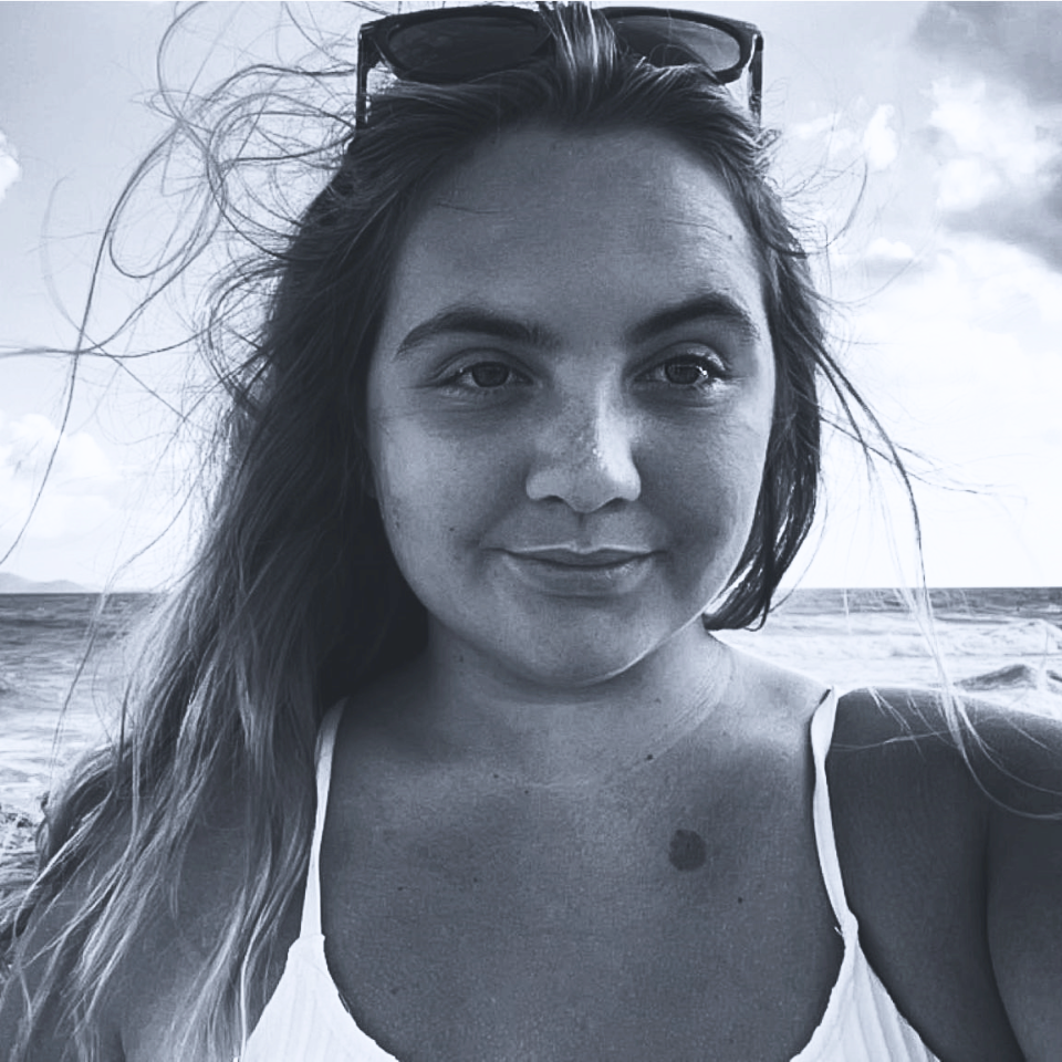 A black and white photo of a woman wearing sunglasses