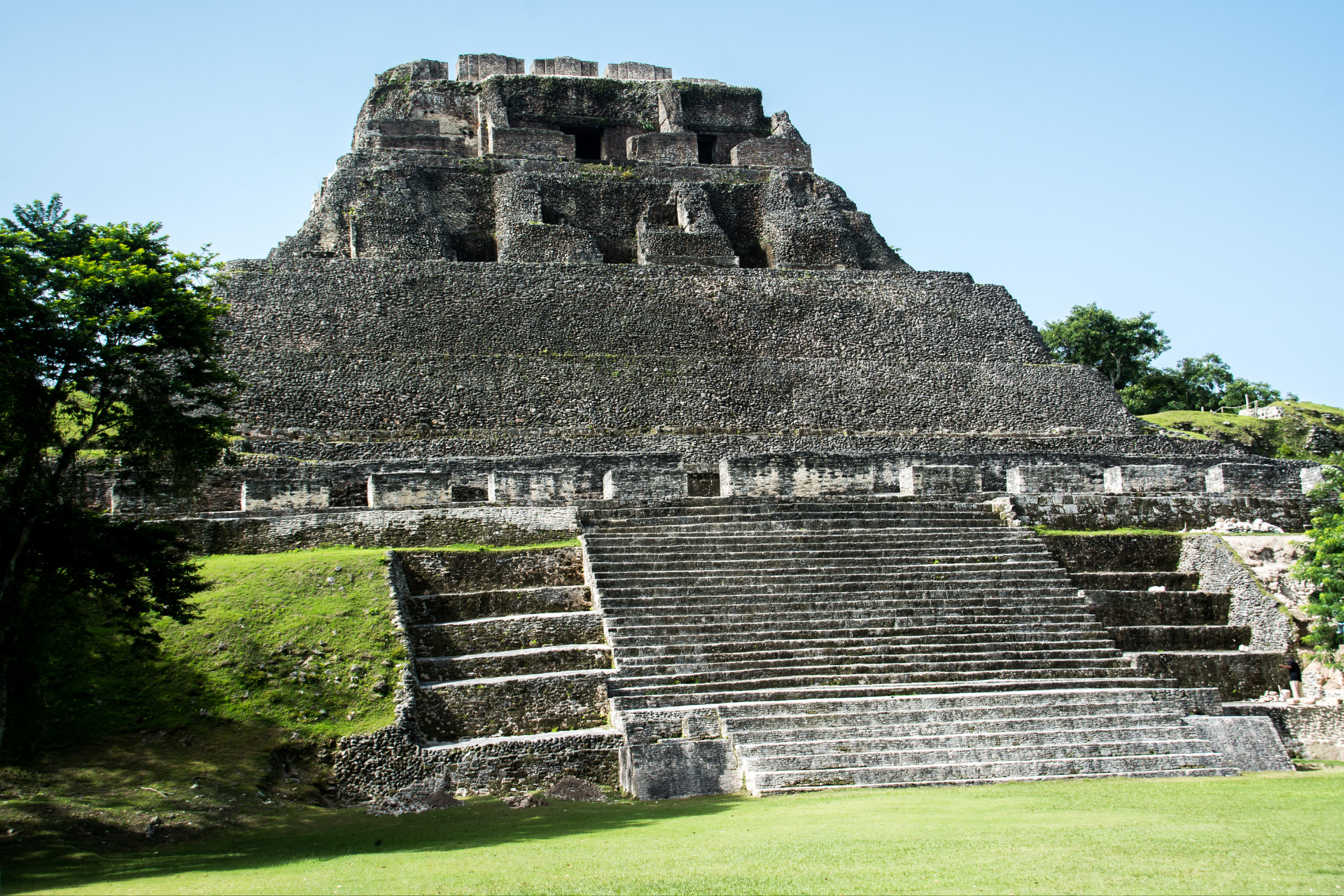 A large stone building with stairs leading up to it