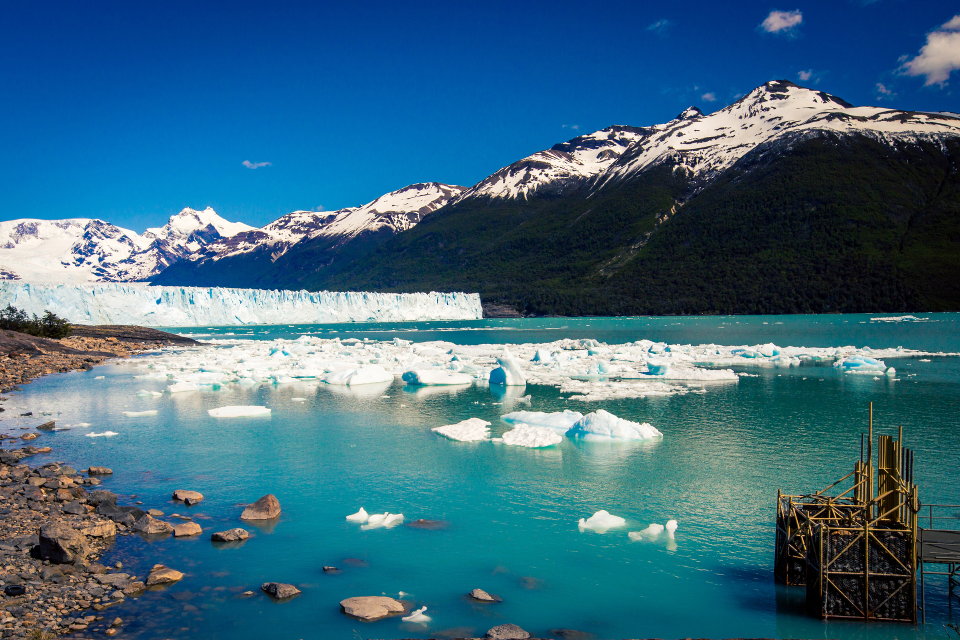 A large body of water with mountains in the background.