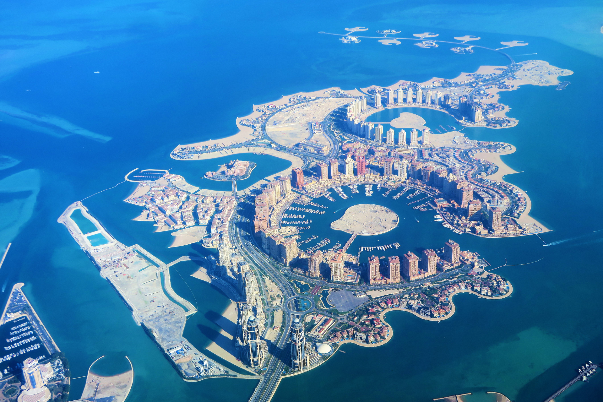 An aerial view of a large island in the middle of the ocean