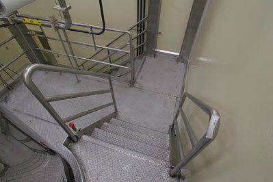 Metal Railing — Curvy Yellow stair railings in South San Francisco. CA