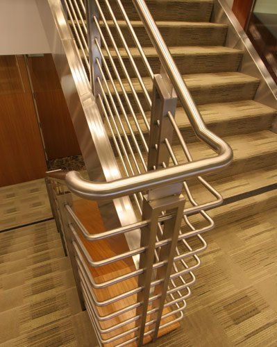 High End Metal Fabrication — Gold staircase rear view in South San Francisco, CA
