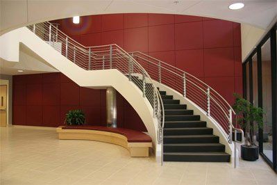 Metal Railing — Curve staircase beside red wall in South San Francisco, CA