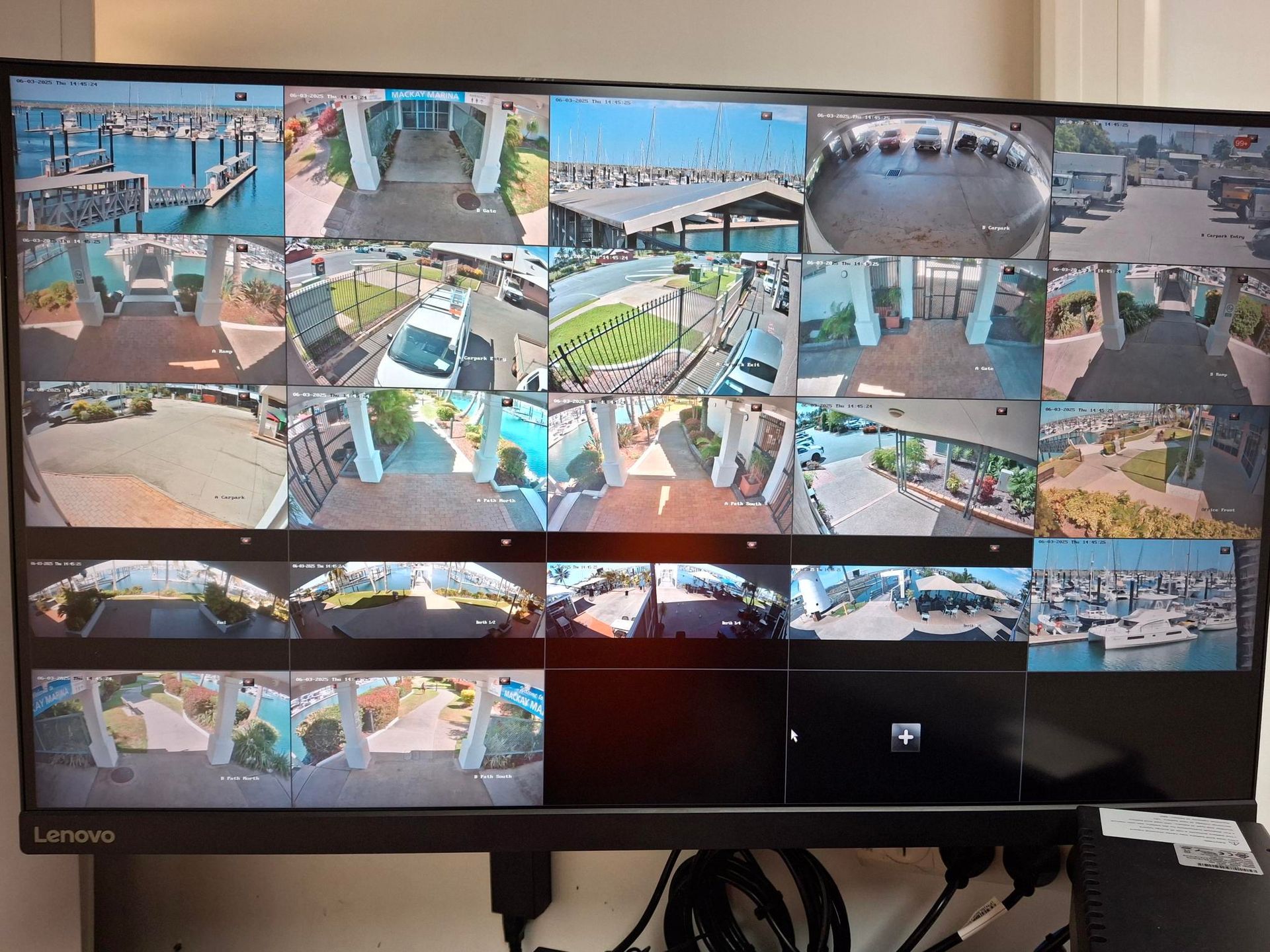 A Large Monitor Displays Multiple Security Camera Feeds — Advanced Alarms Mackay Pty Ltd In South Mackay, QLD