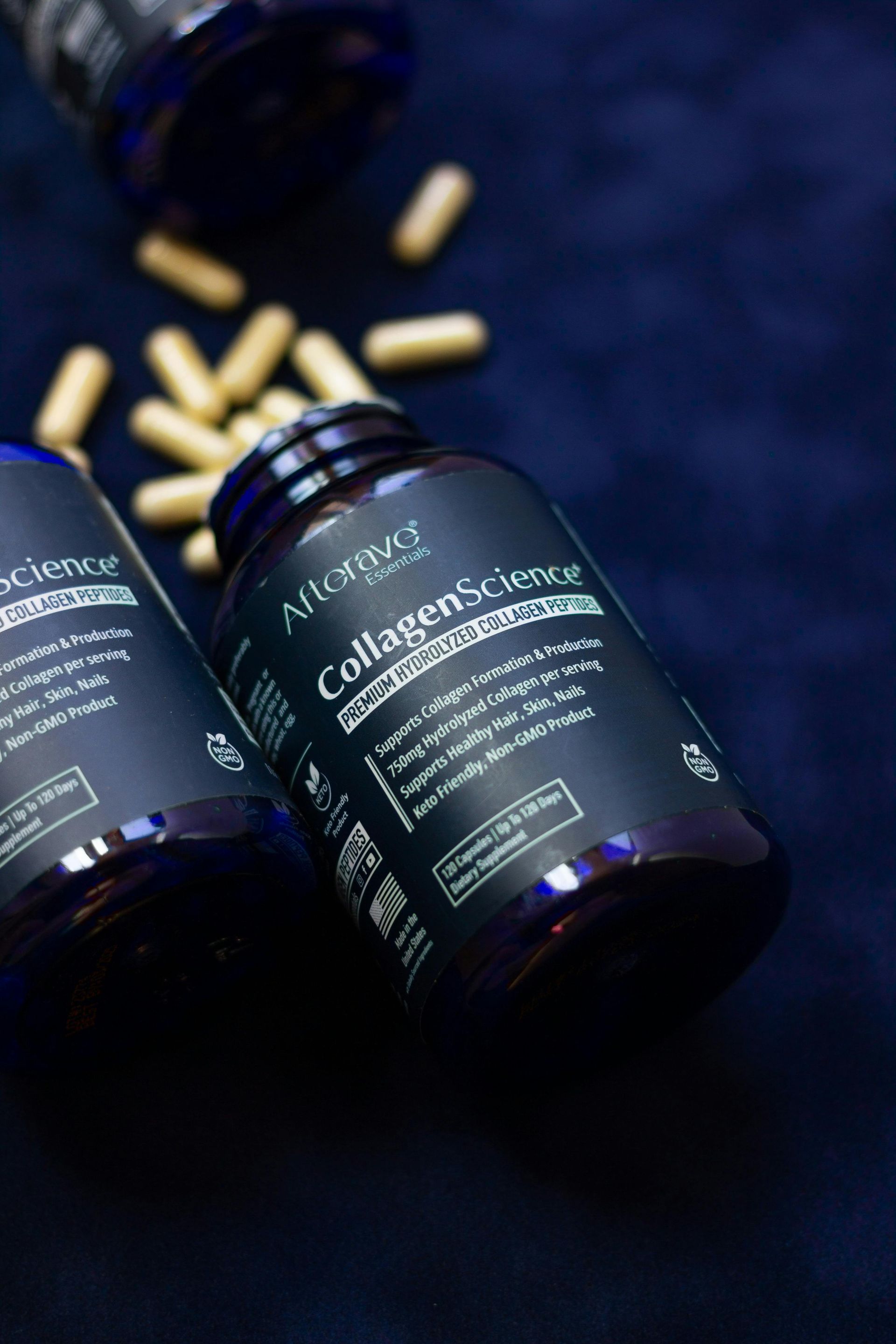 Two dark blue supplement bottles,