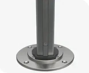 A black awning is attached to the side of a building