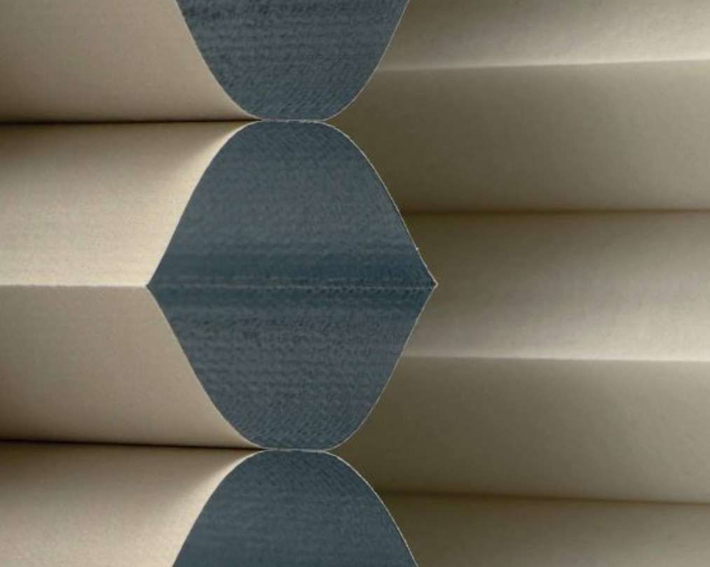 A close up of a piece of paper that looks like a honeycomb