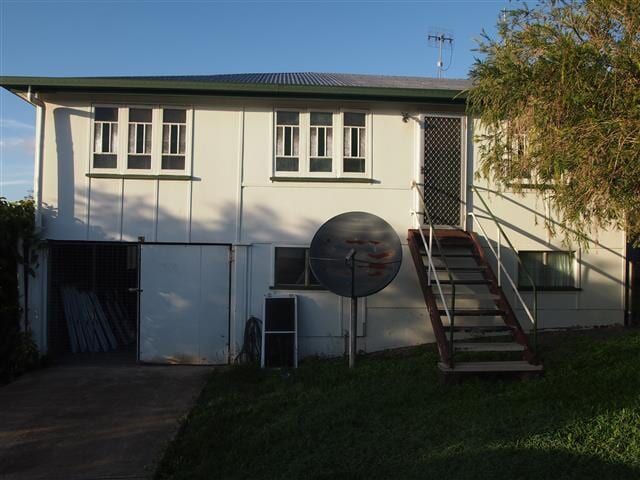 A White House With Stairs And A Satellite Dish — All Style Home Improvements in Hay Point, QLD
