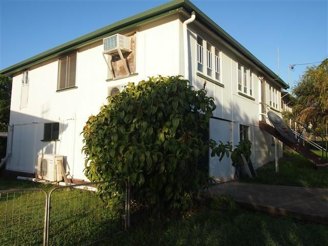 A Large White House With A Green Roof — All Style Home Improvements in Hay Point, QLD