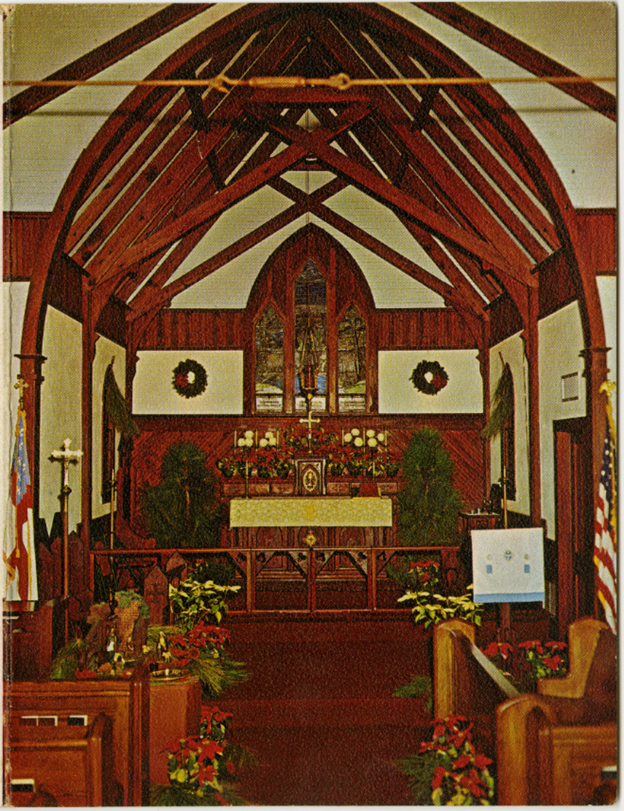 The inside of a church with a stained glass window
