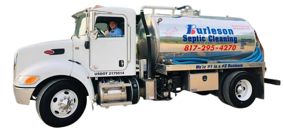 A septic cleaning truck with a man driving it