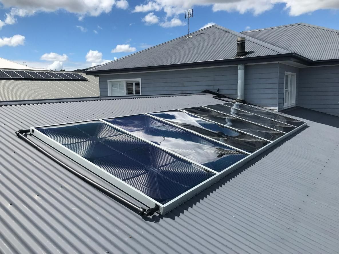 A Roof with a Lot of Solar Panels on it —  Pool Services in Newcastle