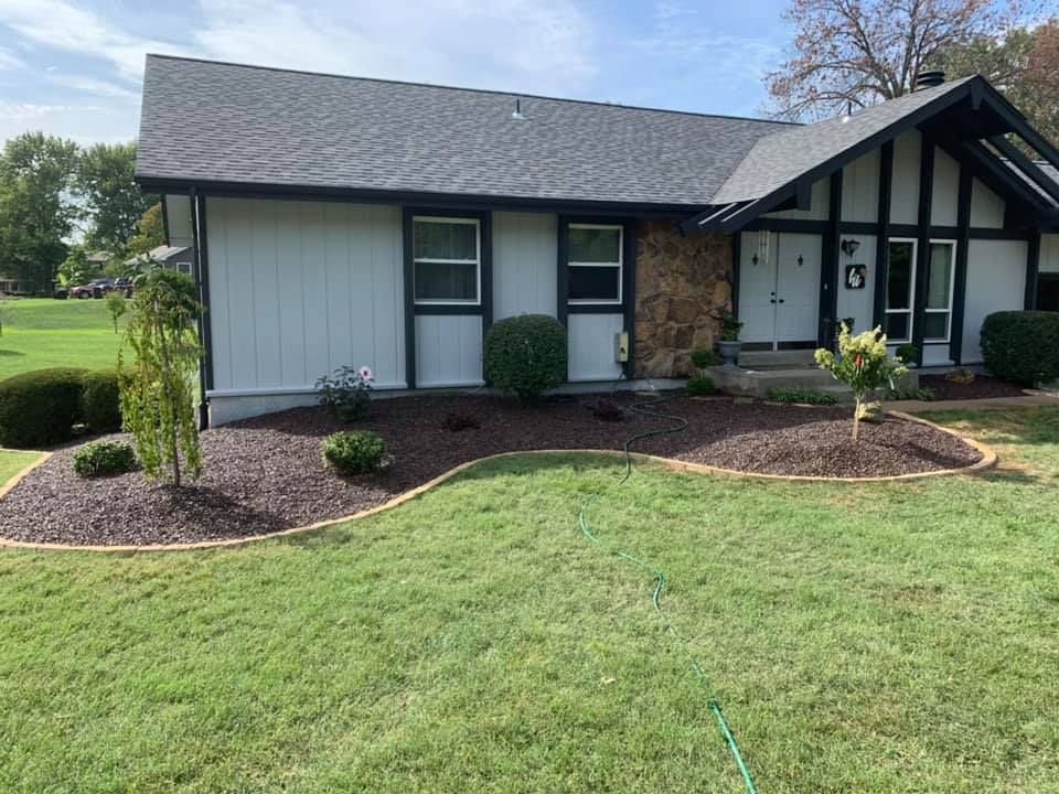 A House With A Lush Green Lawn in Front of It | O’Fallon, MO | Vickscapes Land Maintenance and Pools
