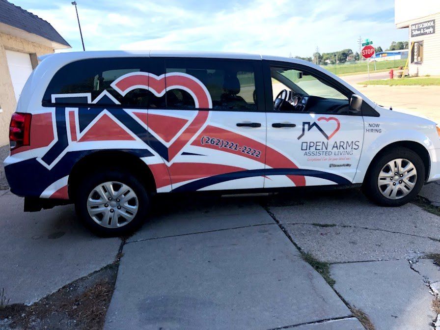 Open Arms Sedan Wrap — Kenosha, WI — Creative Designs Custom Sign