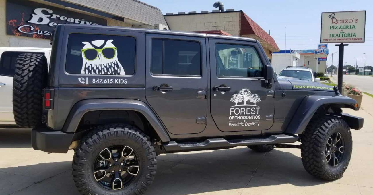 Awesome vehicle lettering — Kenosha, WI — Creative Designs Custom Sign