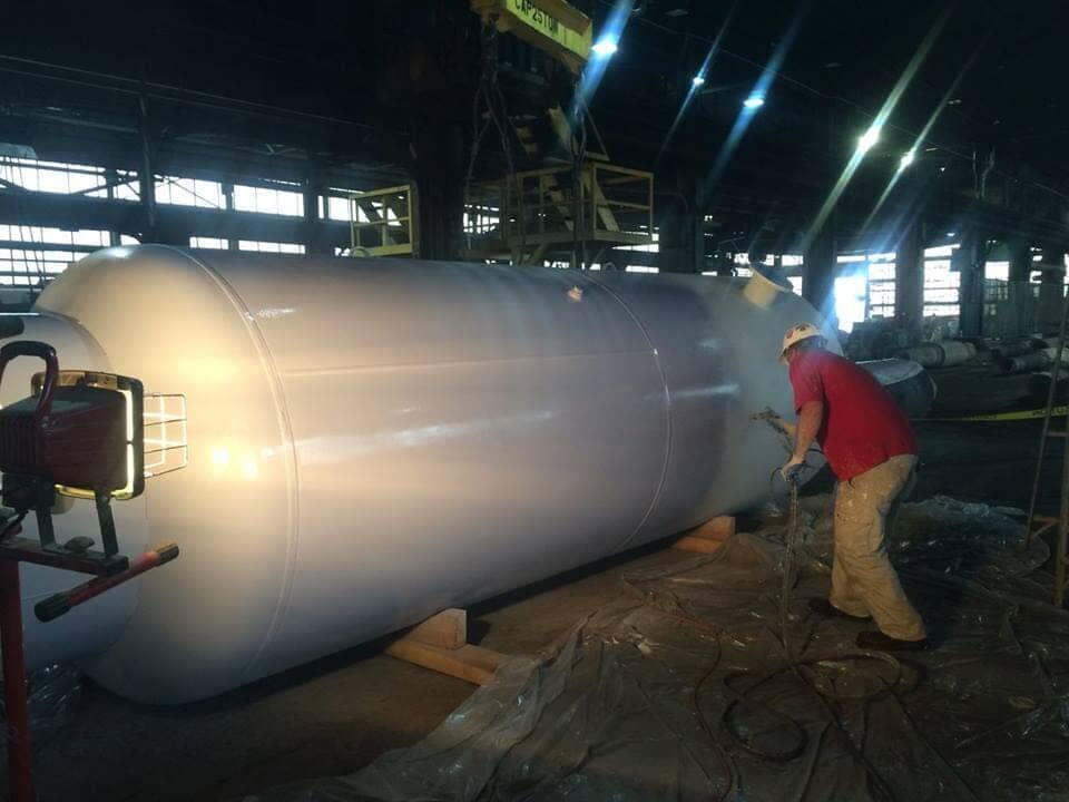 Man Painting the Tank — Lima, OH — TJ Painting And Repair