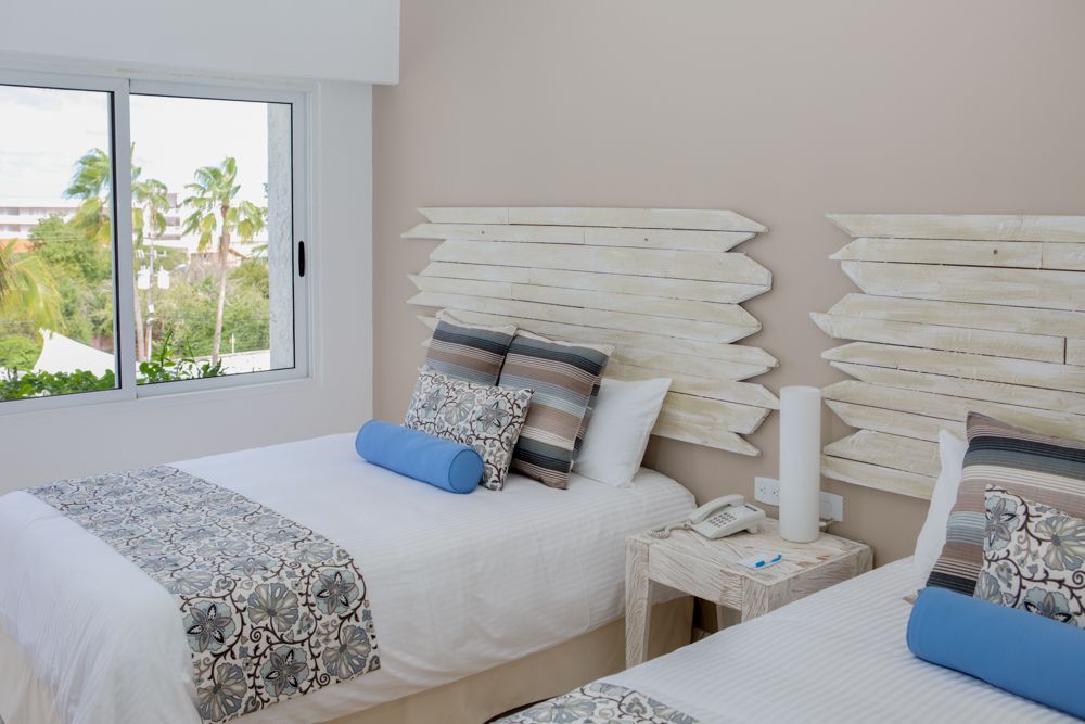 Habitación Superior Doble de H2Otel by LD, diseño vanguardista para un descanso inolvidable en Isla Margarita.