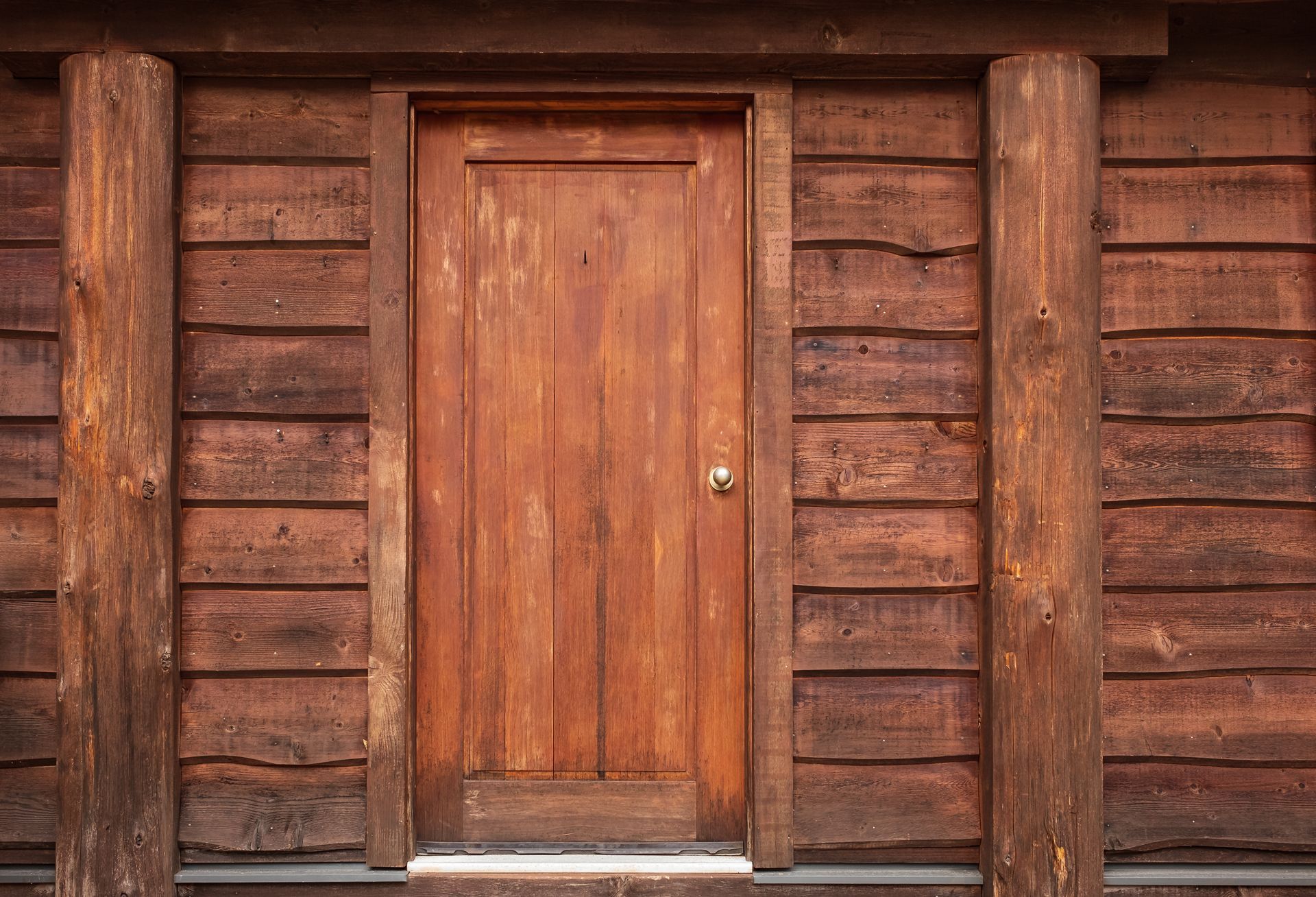 Wooden Front Door in to Rustic Cabin