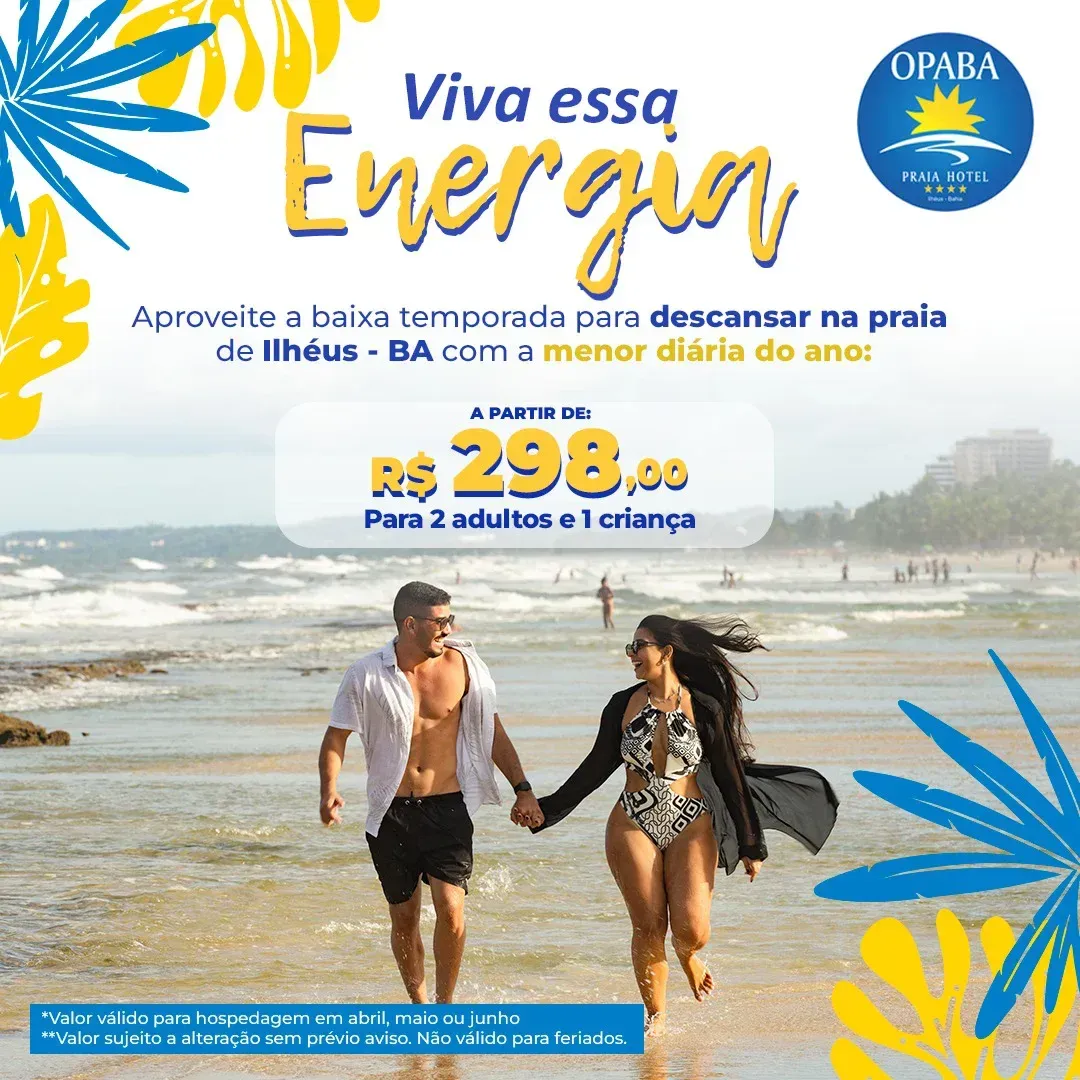 Um homem e uma mulher estão andando na praia de mãos dadas