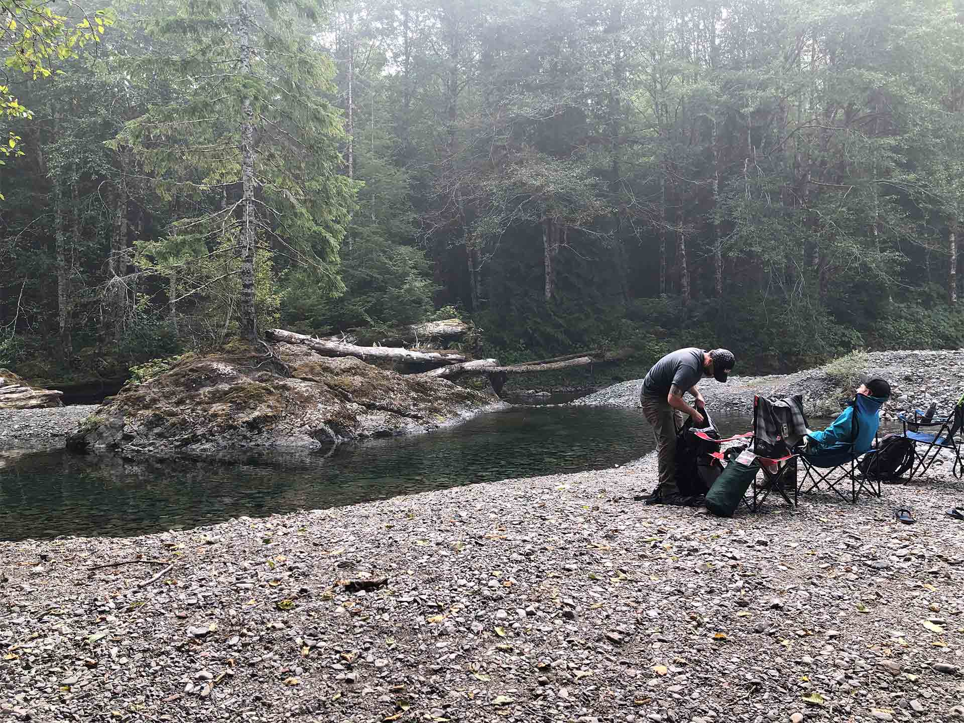 Man sitting on the riverbank - Lacey, WA - All You Need Landscaping