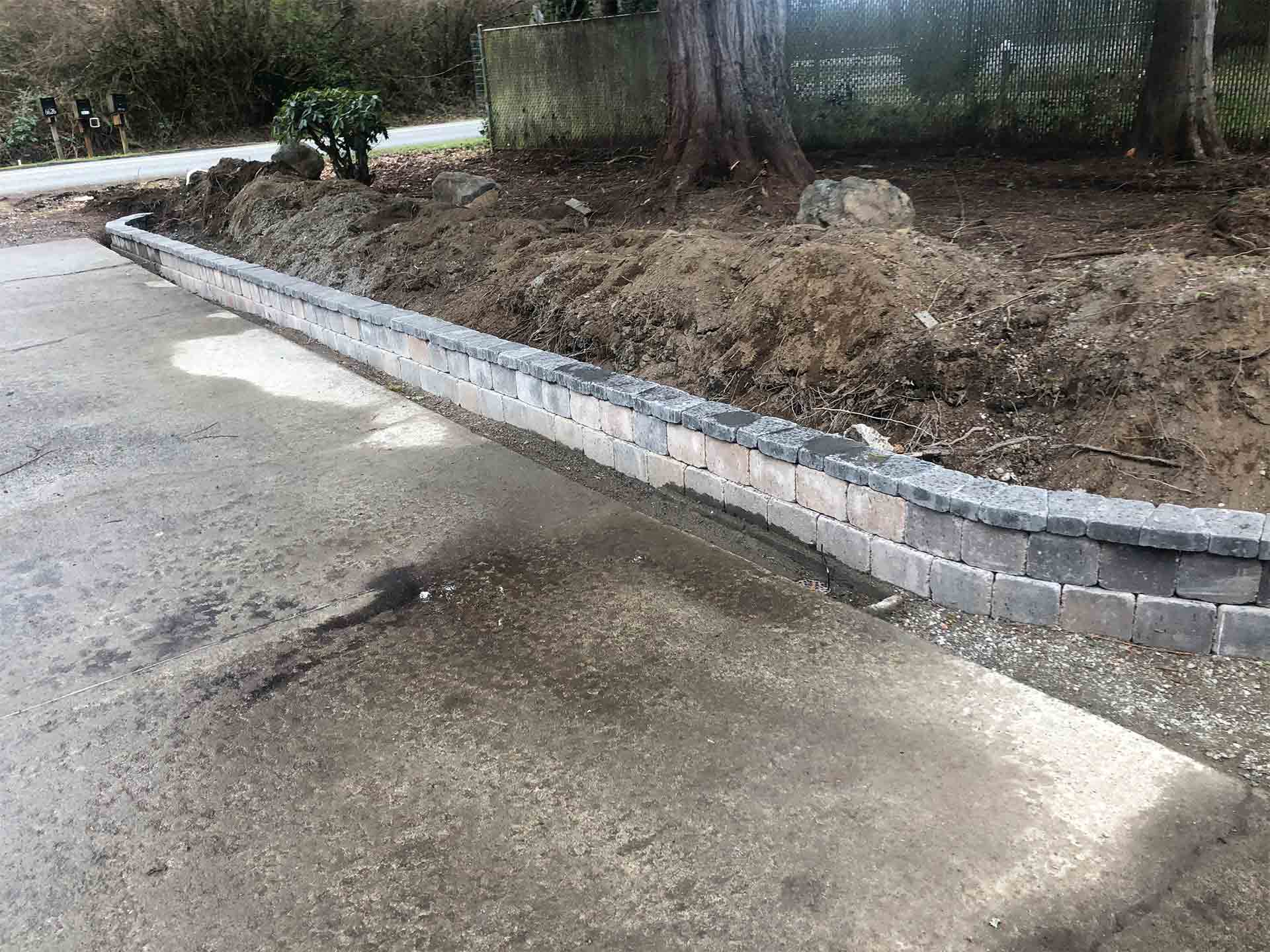 Newly installed stone wall - Lacey, WA - All You Need Landscaping