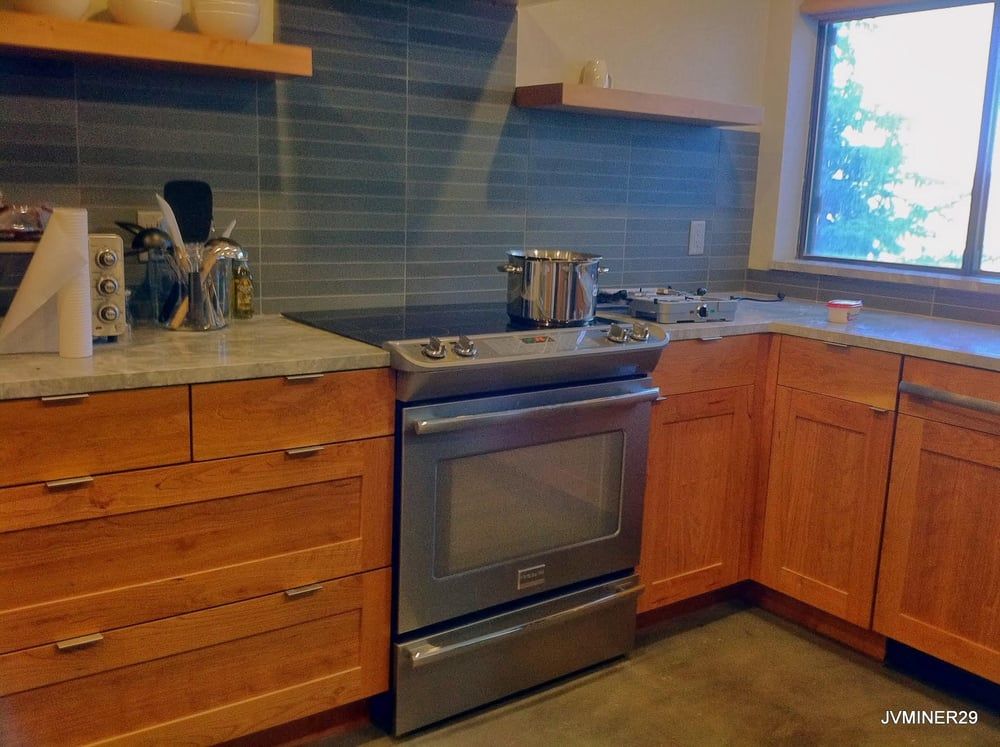 Wooden cabinet with modern stove