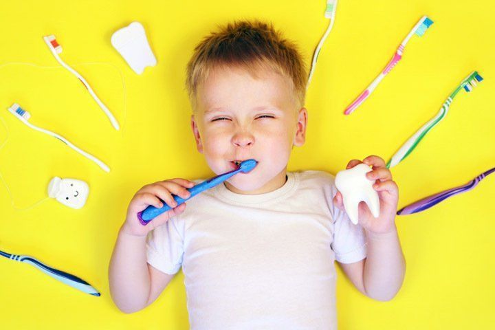 A person brushing their teeth while surrounded by floating toothbrushes and tooth-shaped icons on a bright yellow background.