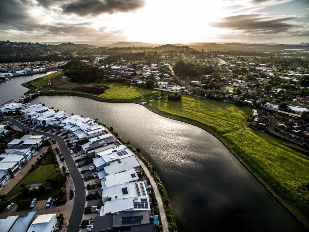 An Aerial View Of A City With A River Running Through It — Another Blind Man In Buderim, QLD