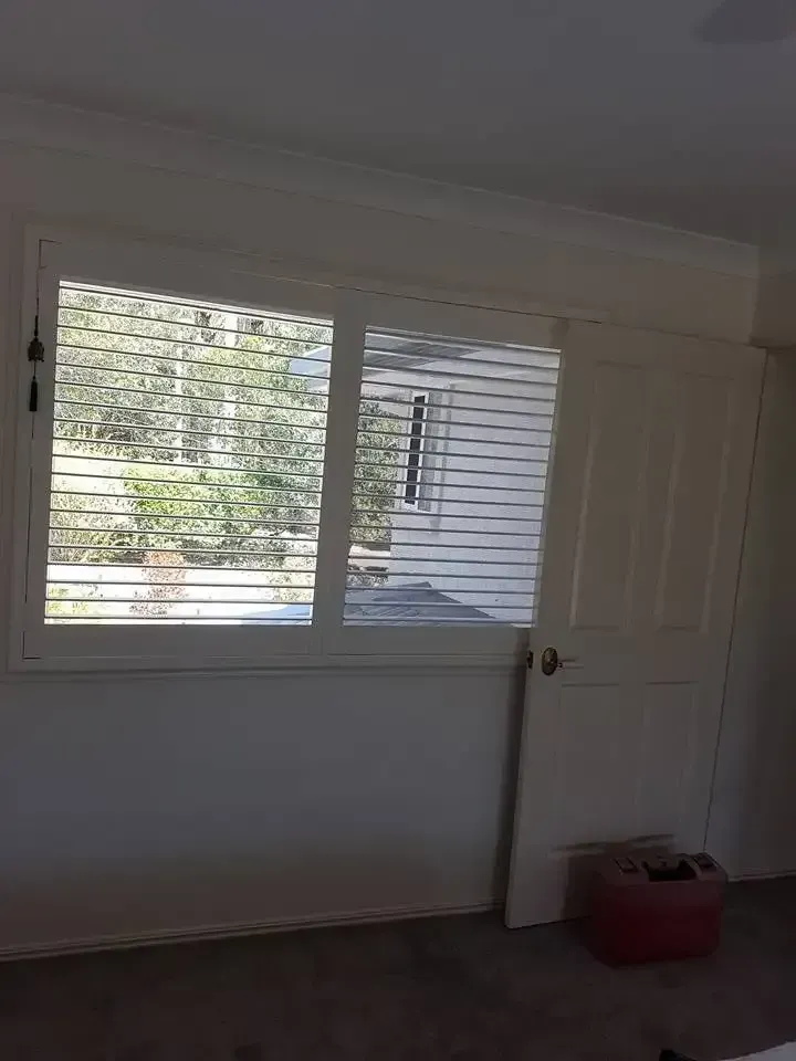 A White Room With White Shutters And Door — Another Blind Man In Buderim, QLD