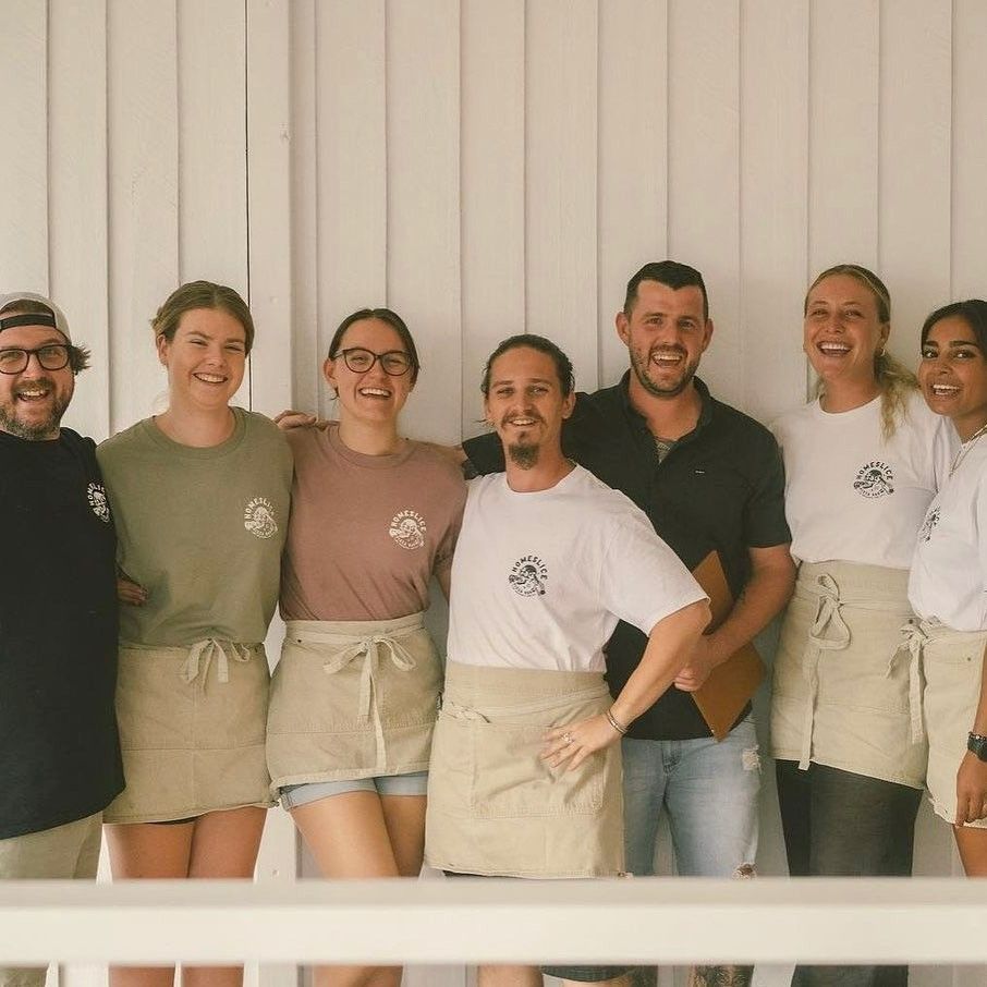 A Group of People Are Posing for a Picture Together — Fab Art in Wallabi Point, NSW