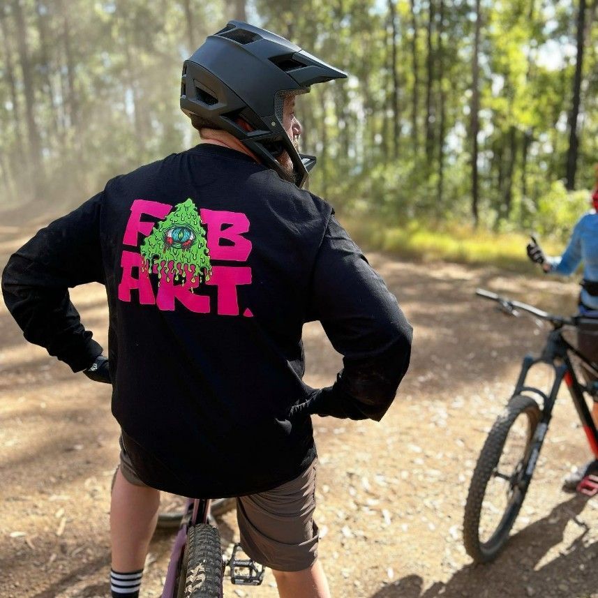 A Person Wearing a Black Shirt That Says Fab Art — Fab Art in Wallabi Point, NSW
