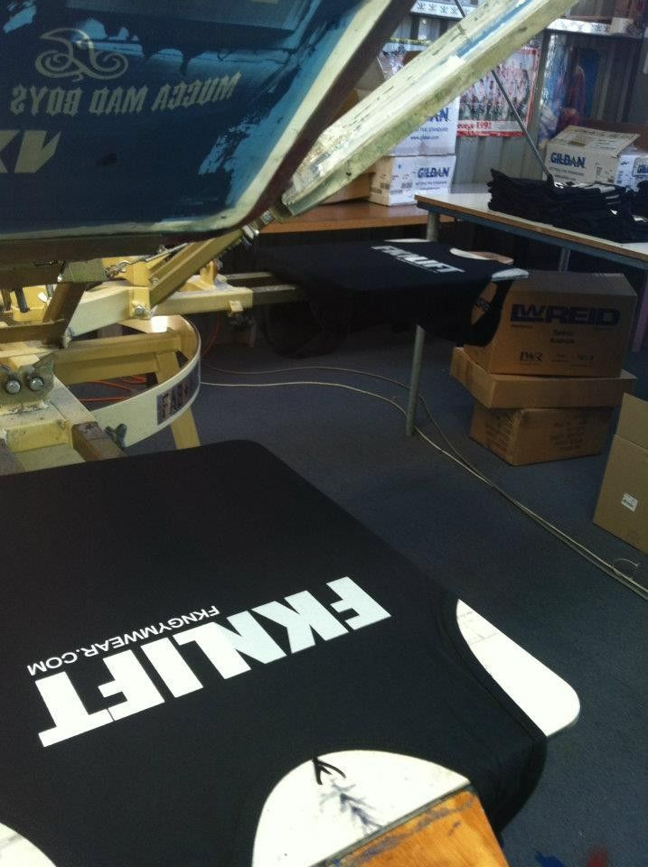 A T-shirt Under the Screen Printing Machine — Fab Art in Forster, NSW