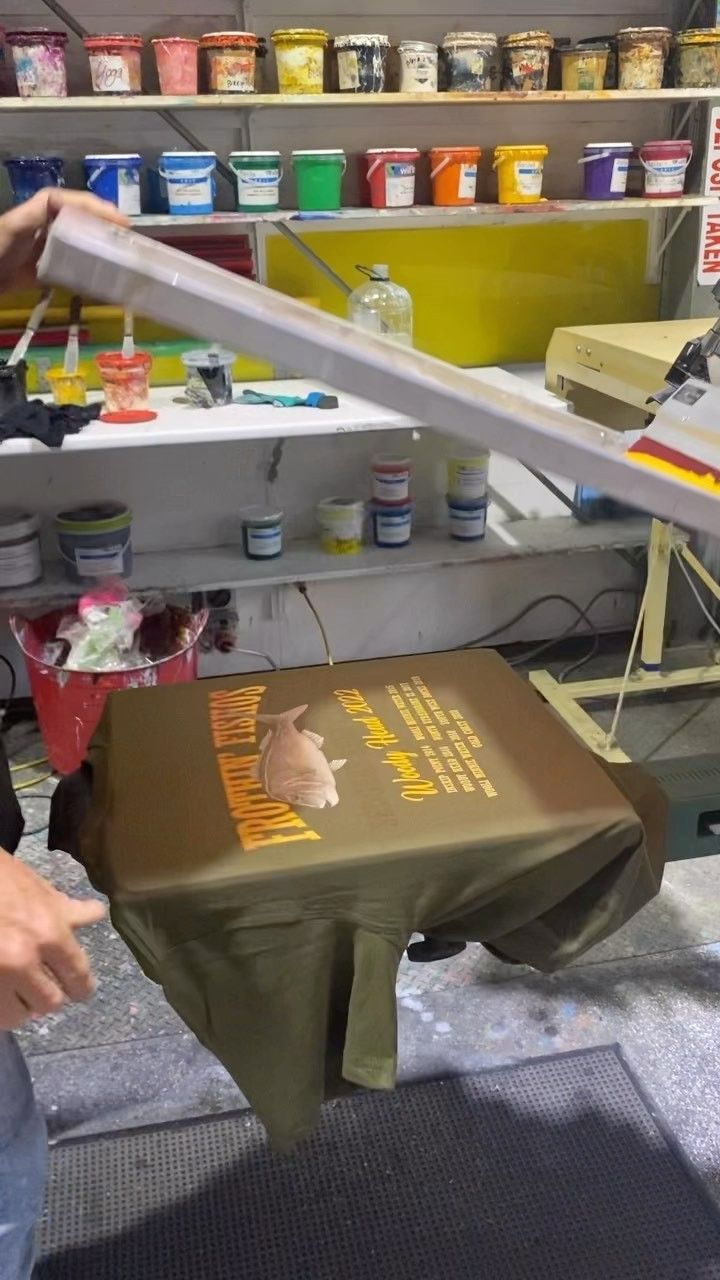 A Person is Printing a T-shirt in a Studio — Fab Art in Wallabi Point, NSW