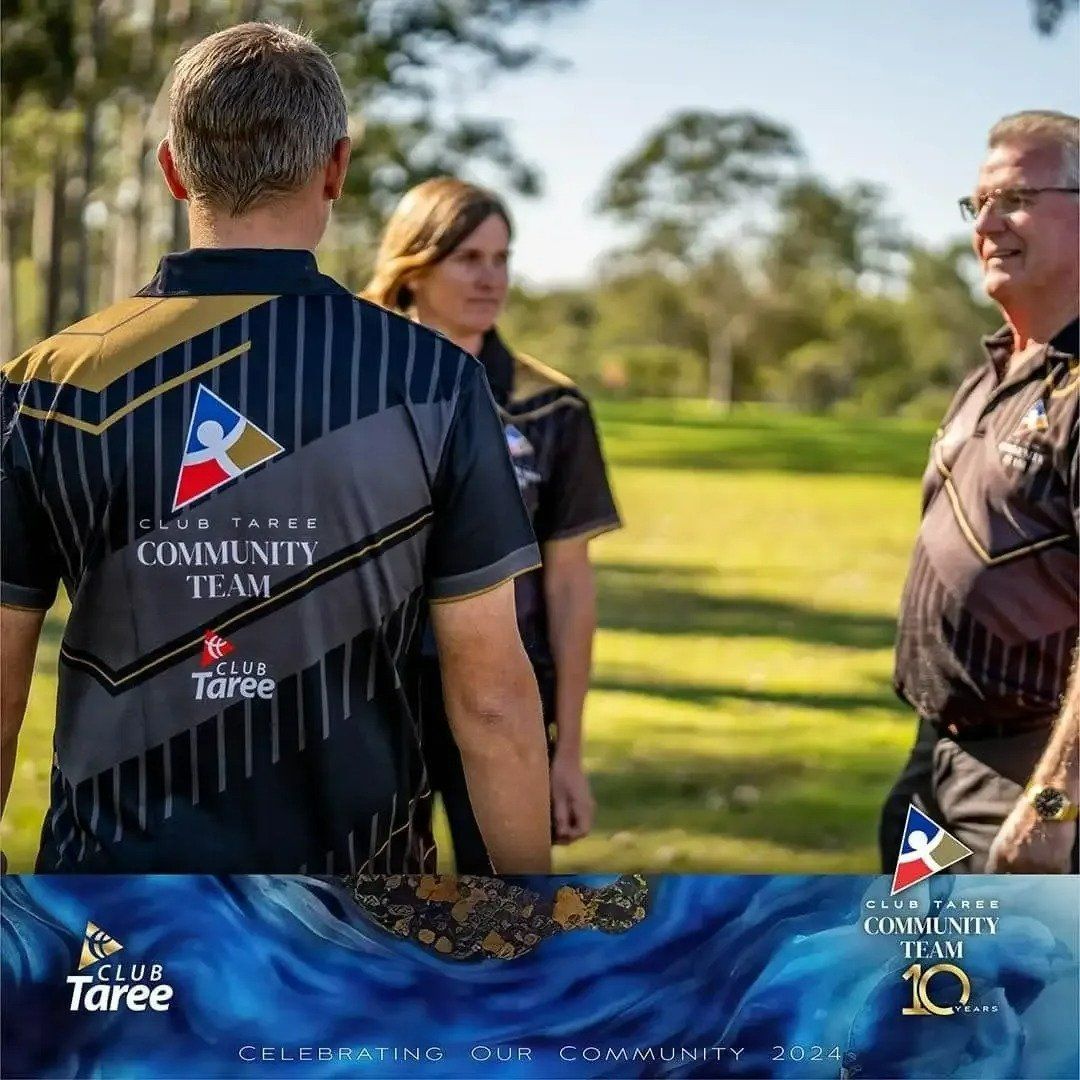 A Man Is Wearing a Shirt that Says Community Team — Fab Art in Taree, NSW