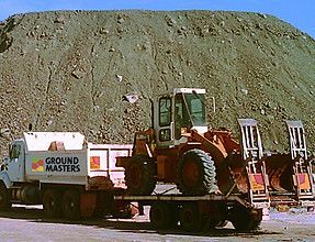 A truck with the word ground masters on it