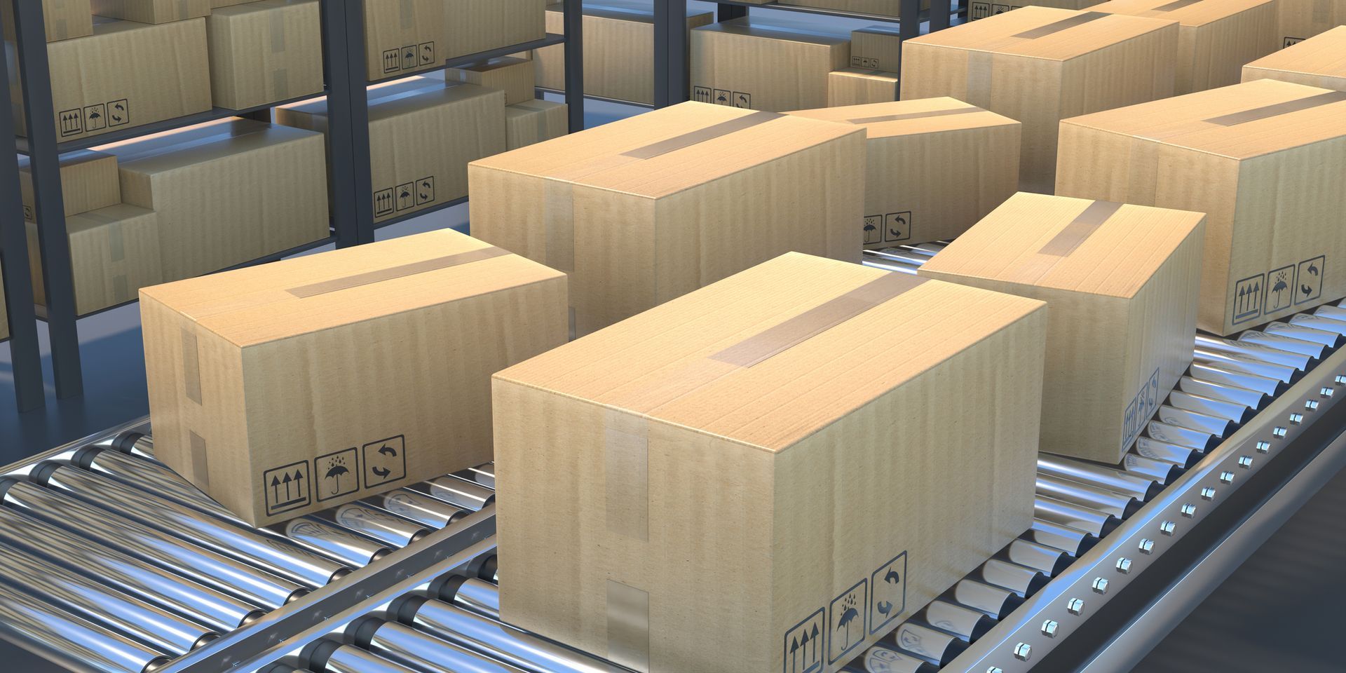 Cardboard boxes on the conveyor belt at an industrial warehouse.